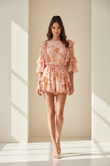 Luxury floral layered romper in Floral Peach – front view