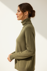 Luxury turtleneck sweater in Dusty Olive, side profile pose