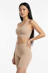 Seamless Sports Bra & Biker Shorts Set in Beige Nude — Three-Quarter Angle