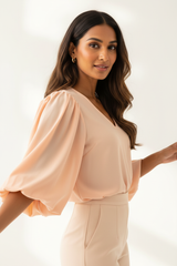 Puff-Sleeve Blouse in Soft Peach - Three Quarter Pose