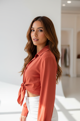 Luxury cropped front-tie shirt in Burnt Coral, three-quarter turn pose