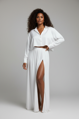 Women's flowy maxi skirt set in white, front-facing pose