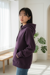 Luxury pullover hoodie in Midnight Plum, three-quarter turn pose