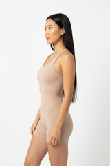 Seamless Racerback Sports Romper in Beige Nude — Side Profile