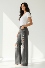 Premium distressed wide-leg denim pants in vintage grey - side profile