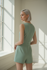 Luxury sleeveless tailored romper in Soft Sage Green – back view