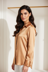 Luxury satin button-up shirt in Champagne Copper, three-quarter turn pose