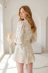 Luxury puff-sleeve romper in Floral Cream – back view