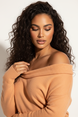 Luxury off-shoulder sweater in Warm Apricot, detail close-up of off-shoulder drape and knit texture