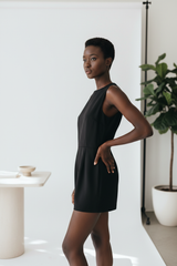 Luxury sleeveless romper in Matte Black – side profile