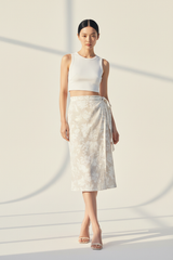 Women's floral wrap skirt set in floral white, front-facing pose