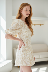 Luxury puff-sleeve romper in Floral Cream – side profile