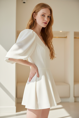 Luxury puff-sleeve romper in Ivory White – side profile