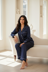 Luxury Silk Pajama Set — Midnight Navy Silk, Seated on Chaise
