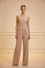 Luxury sleeveless romper in Soft Beige – front view