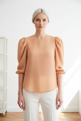 Luxury puff-sleeve shirt in Soft Peach Nude, front facing pose