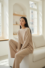 Luxury Ribbed Knit Lounge Set — Soft Beige, Seated on Sofa Pose