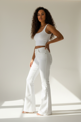 Premium Women's Flared Denim Pants in White Denim - Three Quarter View