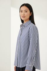 Luxury striped shirt in Coastal Blue Stripe, three-quarter turn pose