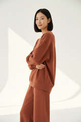 Luxury Oversized Sweatshirt Lounge Set — Burnt Terracotta, Arms Crossed Side Profile