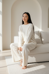 Luxury Ribbed Knit Lounge Set — Ivory White, Seated on Sofa Pose
