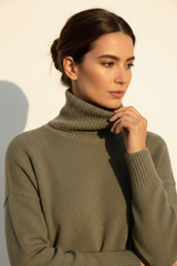 Luxury turtleneck sweater in Dusty Olive, detail close-up of turtleneck collar and knit texture