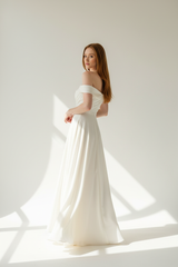 Luxury Off-Shoulder Maxi Dress in Soft Ivory - over shoulder pose