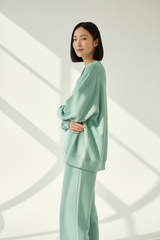 Luxury Oversized Sweatshirt Lounge Set — Soft Mint Green, Arms Crossed Side Profile