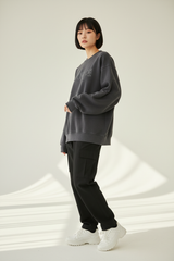 Luxury graphic sweatshirt in Smoky Grey, three-quarter turn pose