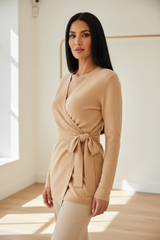 Luxury wrap sweater in Soft Sand Beige, three-quarter turn pose
