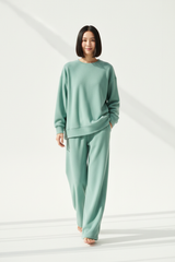 Luxury Oversized Sweatshirt Lounge Set — Soft Mint Green, Walking with Hands in Pocket