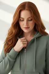 Luxury zip-up hoodie in Dusty Sage, detail close-up of zipper and fabric texture