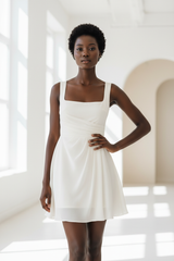 Luxury Square-Neck Mini Dress in Ivory White - hand on hip pose