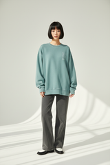 Luxury graphic sweatshirt in Dusty Aqua, front facing pose