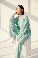 Luxury Oversized Sweatshirt Lounge Set — Soft Mint Green, Seated on Stool