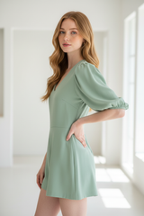 Luxury puff-sleeve romper in Soft Sage – side profile