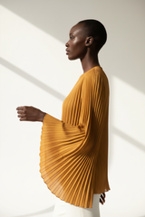Pleated Blouse in Honey Gold - Side Profile Arm Extended