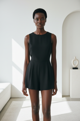 Luxury sleeveless romper in Matte Black – front view