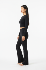 Long Sleeve Performance Top & Flared Yoga Pants Set in Midnight Black — Side Profile