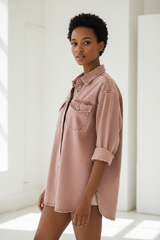 Luxury oversized denim shirt in Faded Rose, three-quarter turn pose