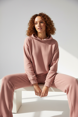 Luxury Fleece Hoodie Lounge Set — Dusty Pink, Seated on Bench